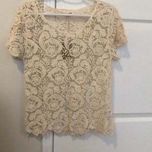 Cream lace top in very good condition. Never worn